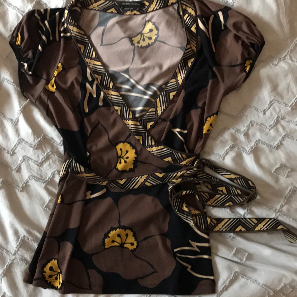 BCBGMaxAzria flower pattern brown/black/yellow wrap top.